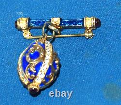 A superb Russian Imperial egg replica brooch pin, Royal blue enamel, diamante